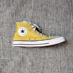These are limited addition bright yellow converse high tops